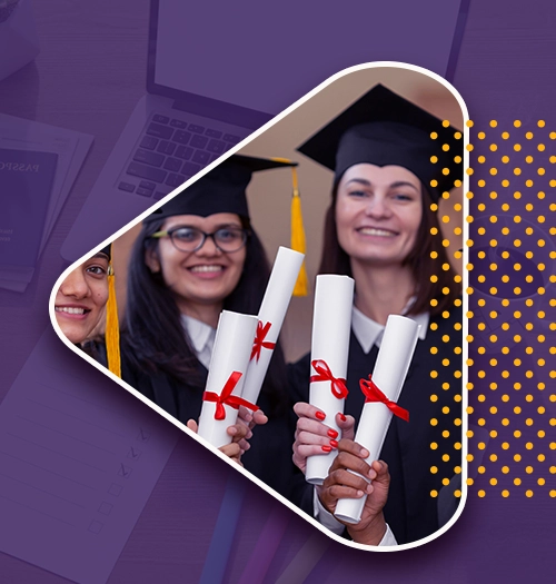 Three smiling graduates in caps and gowns holding diplomas after completing their study abroad program